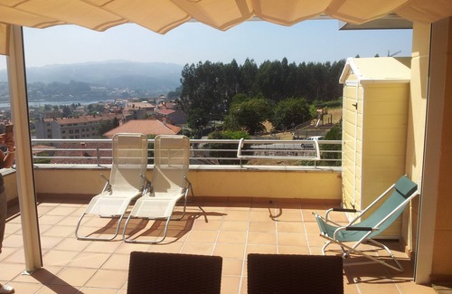 Poio Apartment | VUT-PO- 000403 Balcony Aerial view of the city. Terrace 30 m2 Ria de Pontevedra
