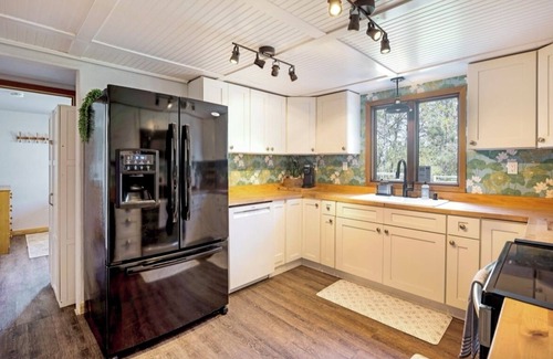 Evaro Apartment | Walk-In Creekside Apartment - Fireplace & Cozy Living Room