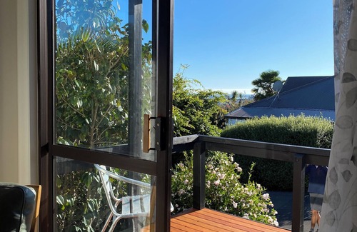 Nelson South Cottage | Walking distance to central Nelson, a sun-drenched cottage with views to the sea