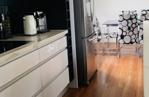 Banksia Beach House | Water front house with magical sunsets