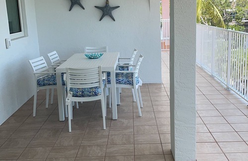 Long Key House | Water front property with bar, tennis, market place, and restaurants close by.