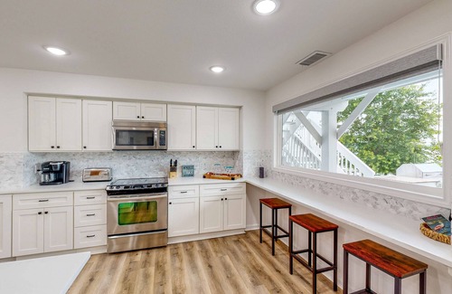 Pointblank House | Waterfront dog-friendly home with pier access, alfresco dining, & kayak