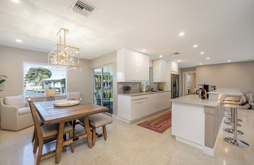 Venetian Way House | Waterfront Gem Stunning Sunsets & Wildlife Views Boat Dock Mins to Beach