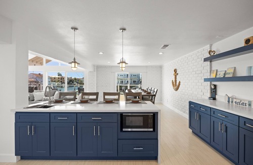 Channel Islands House | Waterfront home with kayaks, grill, Pac-Man, AC, balconies, & smart TVs