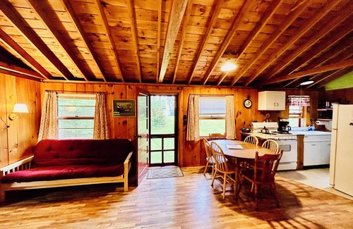 Melvin Village Cottage | Waterfront Lake Winnipesaukee cabins on private sandy beach with dock
