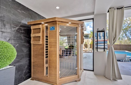 Rock Harbor Villa | Waterfront Luxe Pool, Hot Tub, Theater, Games and More!