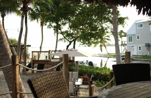 Bay Point House | Waterfront Pool Oasis: Tiki Hut, Kayaks & Family Fun!