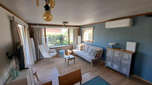 Ooltgensplaat Ski Chalet | Waterlodge met waterfiets op monumentaal fort