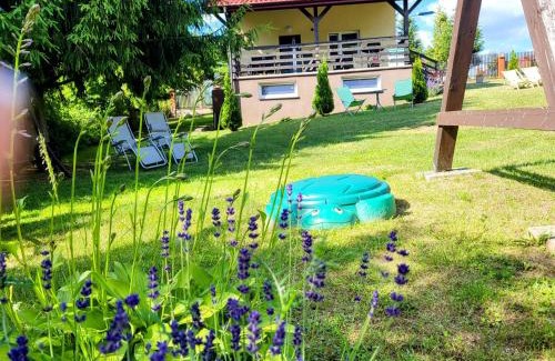 Elk House | WczasyMazurskie - Domek całoroczny Piwonia Mazury z prywatną plażą