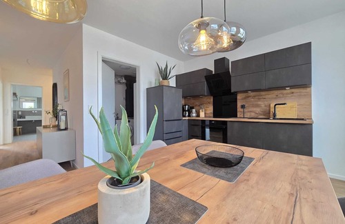 Suderneuland I Apartment | Weiße Düne - stylish living comfort with sauna & balcony at the Norder Marina