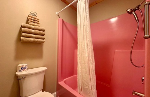 Trout Lake Hotel | Welcoming King Room #6 with AC at lakefront Twin Cedars Resort in Trout Lake MI