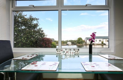 Irstead Cabin | Well-appointed, spacious 3 bedroom riverside cabin in tranquil Norfolk Broads.