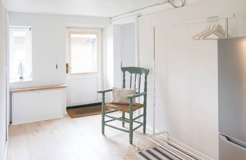 Hasselberg Apartment | West - wood-burning stove, shower, sauna, garden, terrace, close to the beach, child-friendly