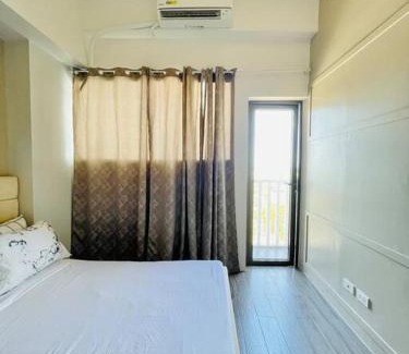 Mandurriao Apartment | WV 8 Serene Family Room