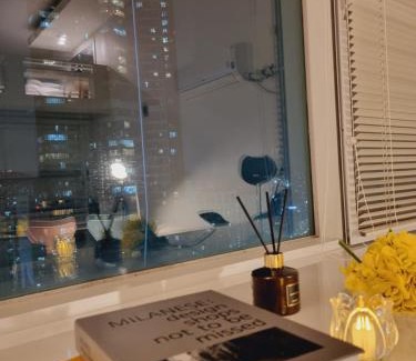 Bucheon Apartment | Yellow House - Duplex, Night view, White modern interior