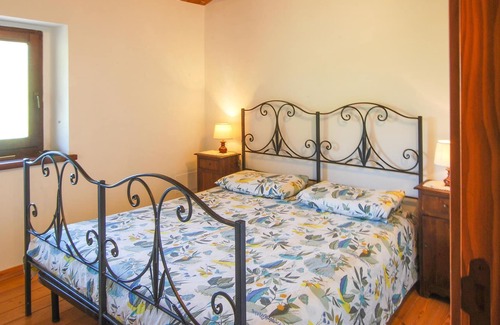 Pievefavera House | You will be greeted by a beautiful stone house with many amenities overlooking Lago di Borgiano.
