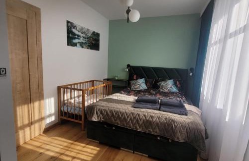 Slupsk Apartment | Zielony apartament w Wileńska Park i prywatne miejsce w garażu podziemnym