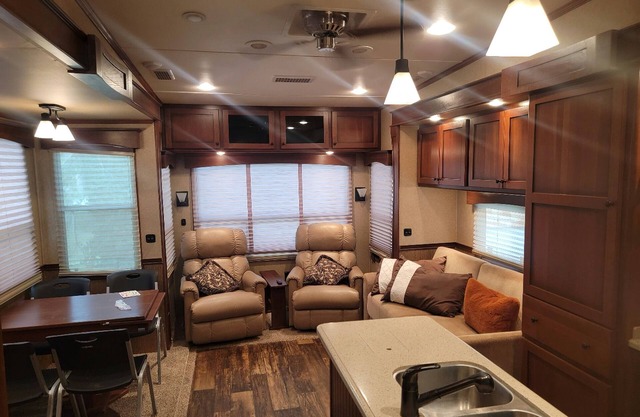 1 mile East of Disney, safe fenced property, lots of room for trailers and rigs!