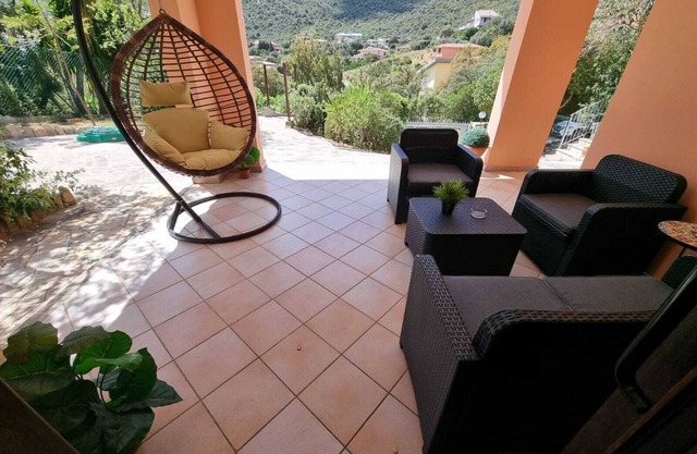 2 DOUBLE BEDS, MINI FRIDGE, COFFEE MACHINE, MICROWAVE OVEN, TABLE.