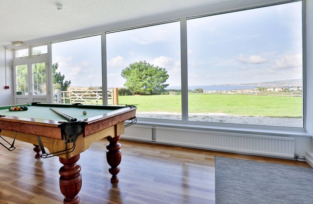 7 Bedroom house with Stunning Sea Views nr Port Isaac. Pool,games rooms,log fire