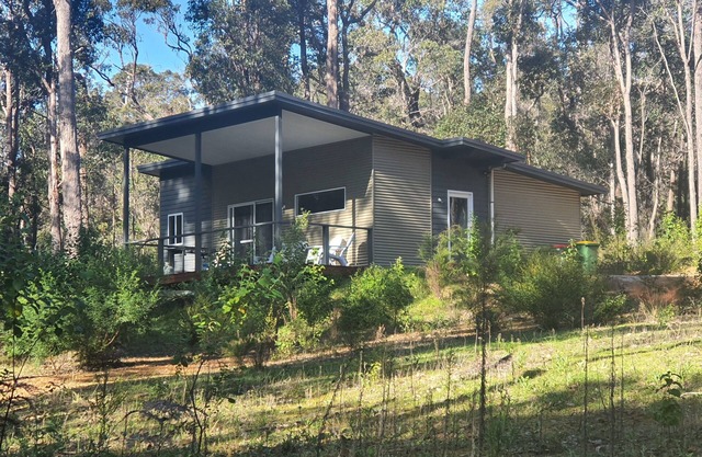 A beautiful chalet in a secluded bush environment, only a short walk to town.