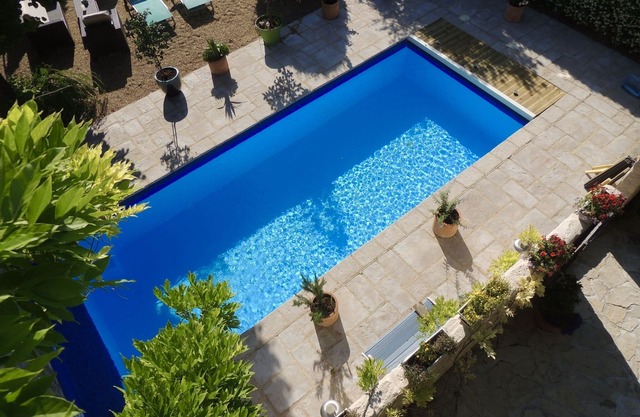 A character stone house with private heated swimming pool.