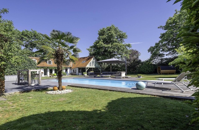 A charming holiday home with a swimming pool.