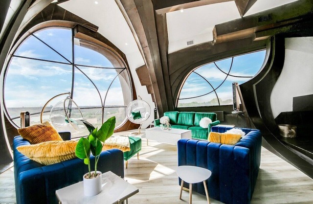 A stay like no other—inside an iconic steel sculpture with panoramic canyon and lake views.