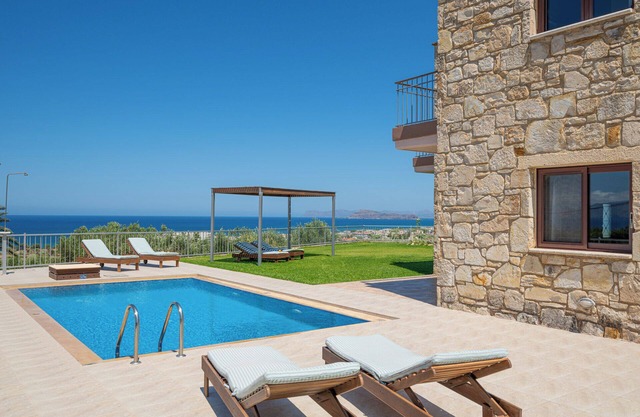 A stone villa with private pool and panoramic sea view