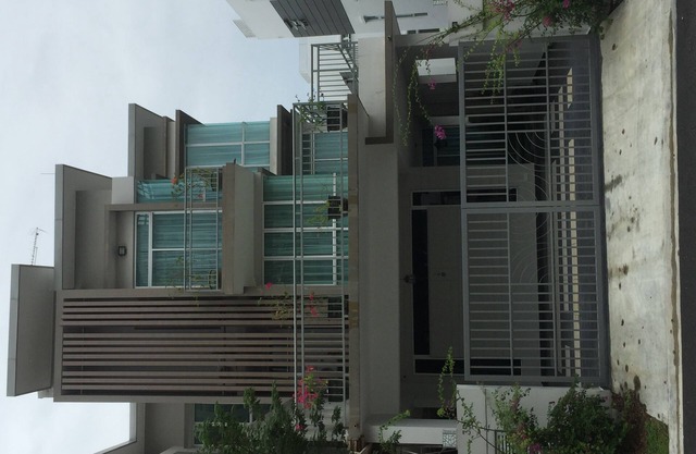 A well-decorated 3-storey house near Malaysia-Singapore border checkpoint.