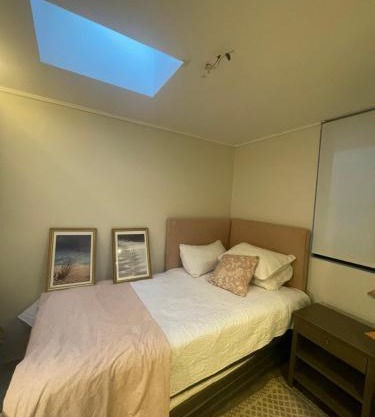 Acogedora habitación junto a nuestra familia en exclusivo sector de Santiago