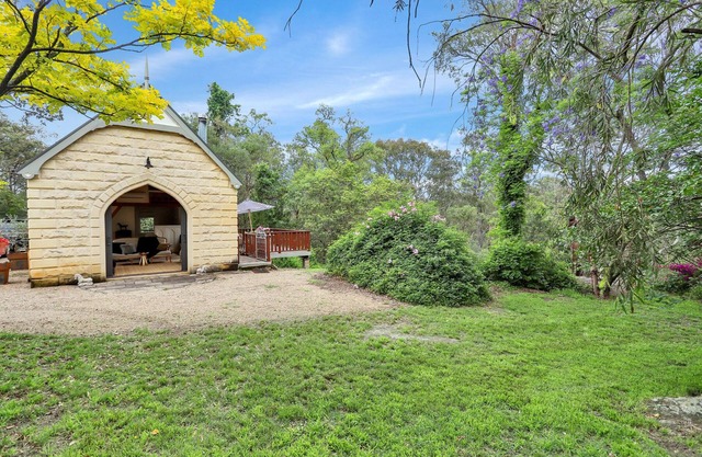 Ambient stone guest house set amongst a historical farmhouse backdrop.