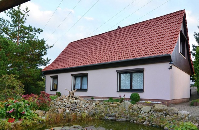 Apartment in the Harz with a log cabin, pond and covered seating area