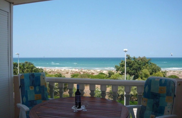 Apartment directly on the dune beach with pool, fantastic sea view, WIFI