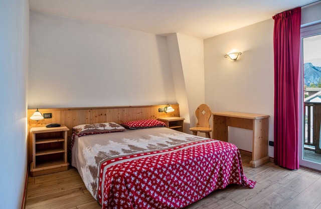 Apartment 'Giongo Residence Aparthotel 101' with Mountain View, Shared Terrace and Wi-Fi