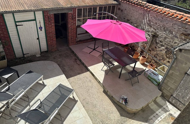 Attractive central town house with local parking, tobacconist, baker, ATM.