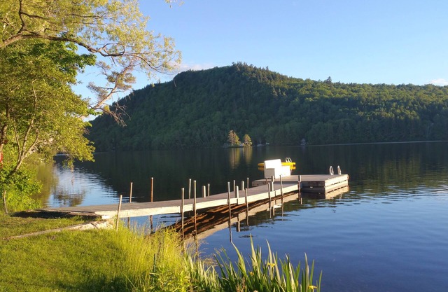 Awesome unique home right on the lake with huge yard, hot tub near Sunday river