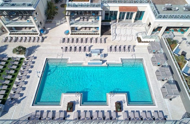 Bask in Modern Style Comfort! 2 City View Units, Beachfront Property w/Pool