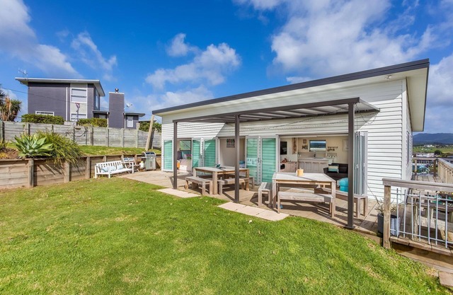 Beach Time - Modern, sunny home close to amenities, a great place to relax and watch the kids play