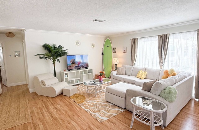 Beautiful 2 bedroom poolside beach house. Beaches and shopping mall 5 mins away.