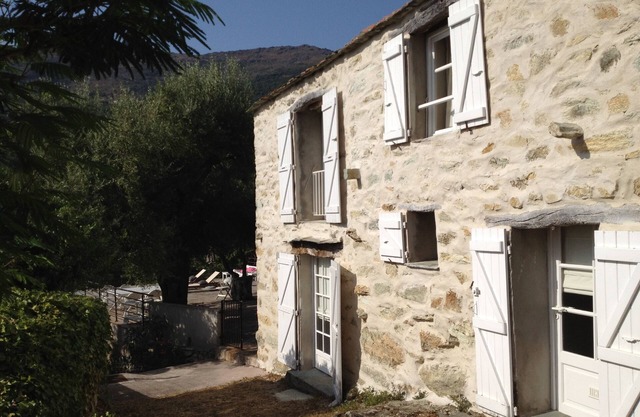 Beautiful air-conditioned character house with large sea view terrace.