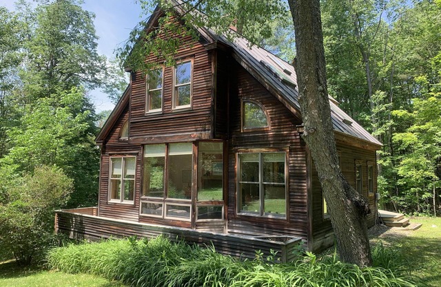 Beautiful craftsman-built home with natural wood and large windows in every room