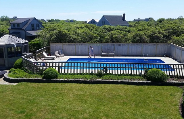 Beautiful home with private heated pool, basketball and large outdoor space.