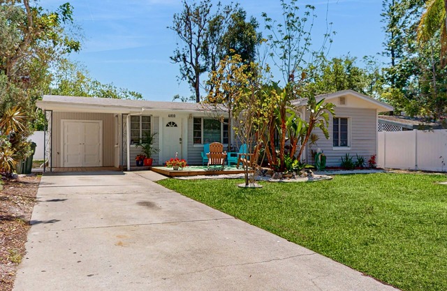 Bright, airy and centrally located with fenced yard, dog friendly, close to Gulf