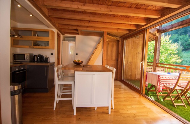 Charming Alpine Retreat with Stunning Views, Private Balcony & Summer Pool