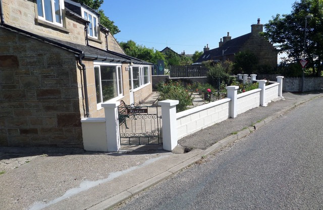 Charming, newly renovated cottage in Highland village location, with sea views.