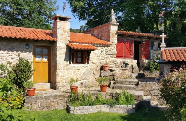 Charming traditional stone cottage nestled in the woods minutes from coast