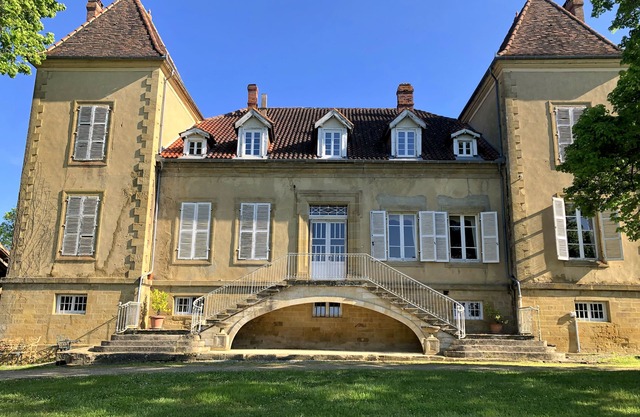 Château on a hill surrounded by its own land overlooking the countryside