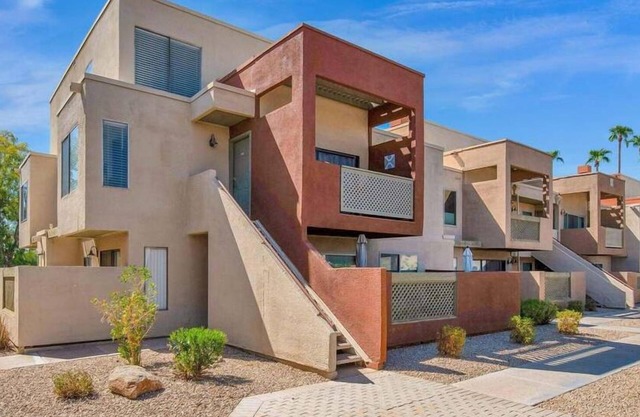 Chic 1 and 1/2 bedroom + loft condo in Scottsdale with community pool + gym