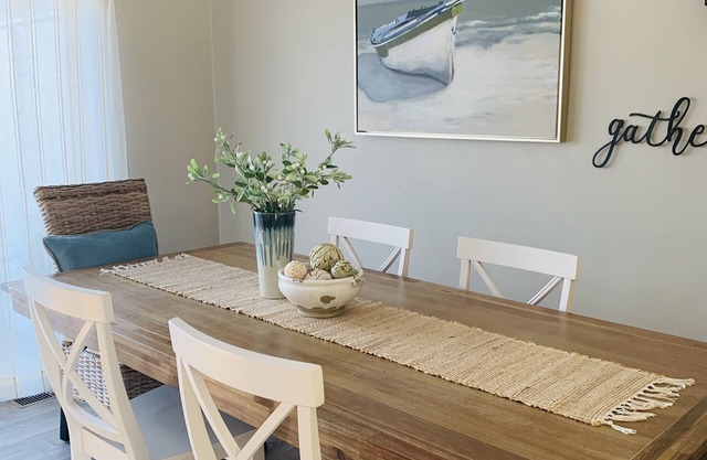 Coastal chic waterfront townhouse w/bayside sunsets.